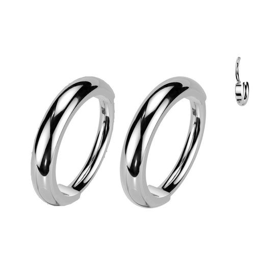 Pair of silver hoop earrings.
