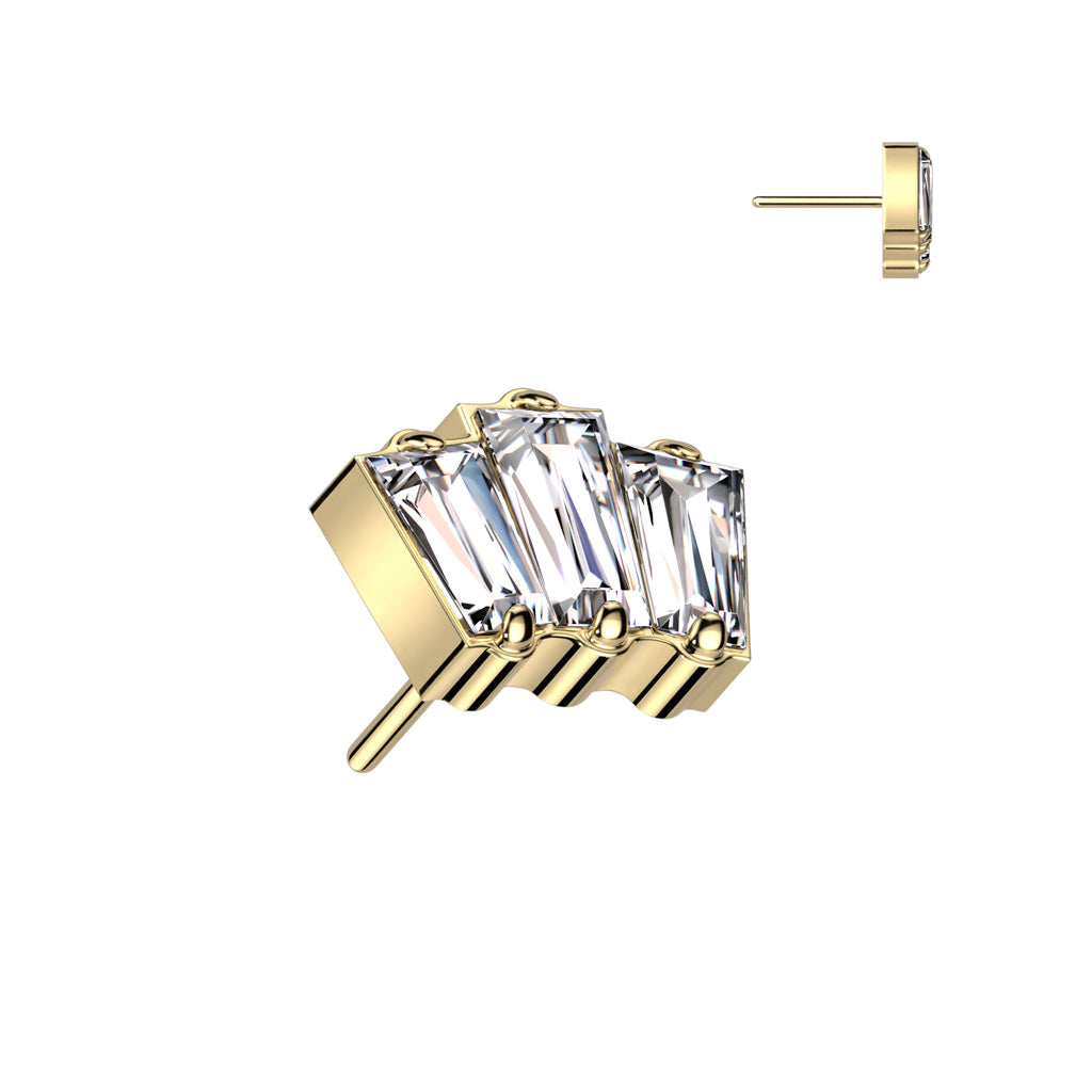 Gold earrings with clear gemstones shaped like a baguette cluster.